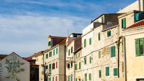 Low angle view of residential buildings against sky