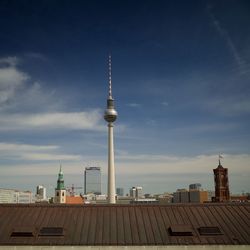 Buildings in city against sky