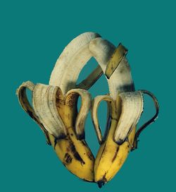 Close-up of bananas against blue background