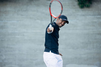 Man playing tennis