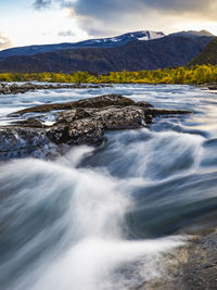 View of river in mountains