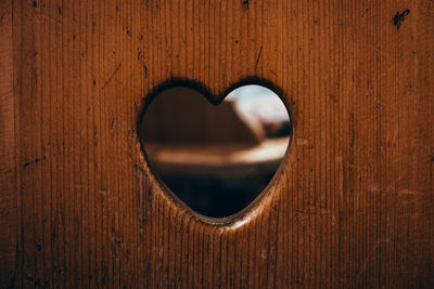 Close-up of heart shape on door