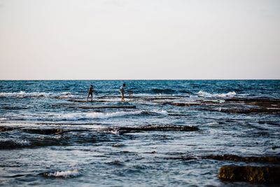 Scenic view of sea against clear sky