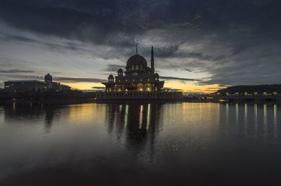 Putra mosque, putrajaya, malaysia with colorful sky background and nice reflection from the lake.