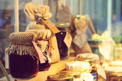 Close-up of preserves in jars on shelf