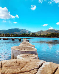 Scenic view of lake against blue sky