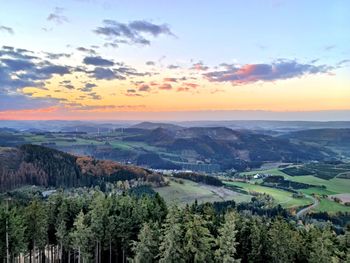 Scenic view of landscape against sky during sunset