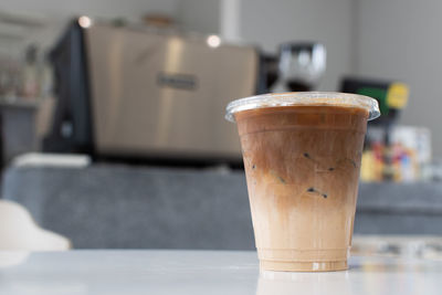 Close-up of coffee cup on table