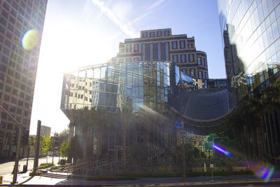 Street amidst buildings against sky in city