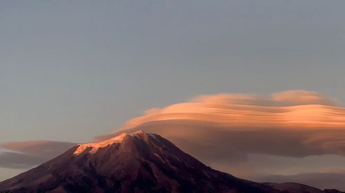 Scenic view of mountain against sky during sunset