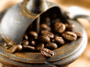 Close-up of coffee beans on table