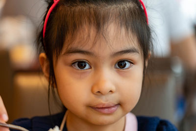 Close-up portrait of cute girl