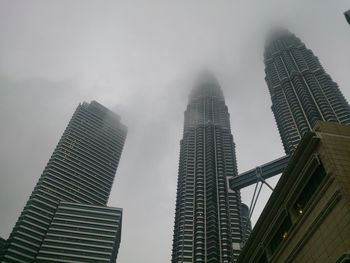 Low angle view of skyscrapers in city