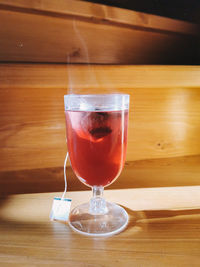 Close-up of wineglass on table