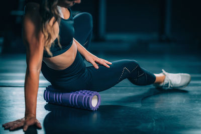 Using foam roller for muscle and fascia stretching and conditioning