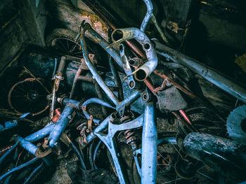 High angle view of old rusty wheel