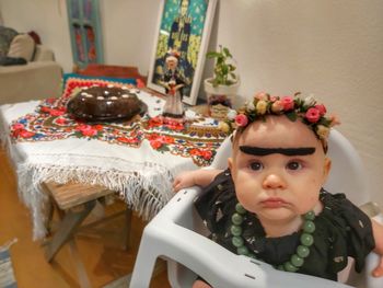 Portrait of cute baby at home