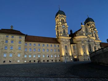 Low angle view of historic building against clear sky