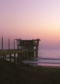 Scenic view of sea against clear sky during sunset