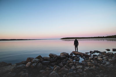 Blue-red-pink frosty sunrise at lake oulujarvi near the town of paltamo in kainuu region, finland