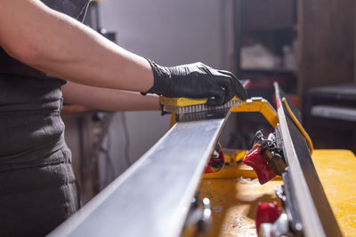 Close-up of person working on cutting board