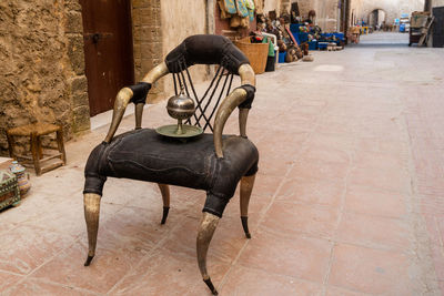 Incense burner in an ivory chair