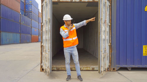 Full length of worker working at observation point