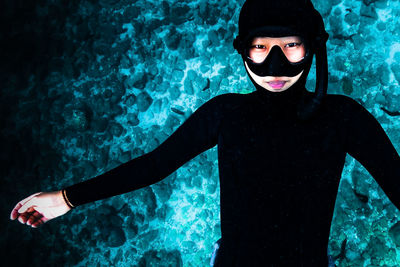 Portrait of woman swimming in sea