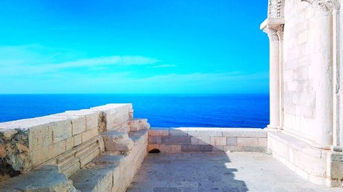 Scenic view of sea against blue sky