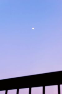 Low angle view of moon against sky
