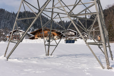 Solar panel, photovoltaic panels pv on a house roof. electricity from the sun. house and mountains