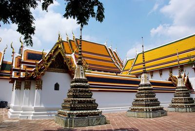 Ornamented towers of buddhist temple wat pho in bangkok, thailand 