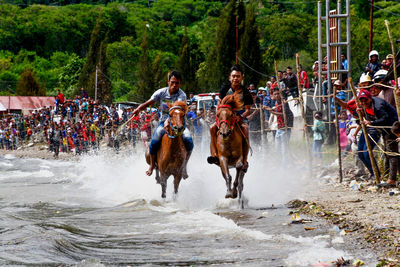 Group of people riding horses