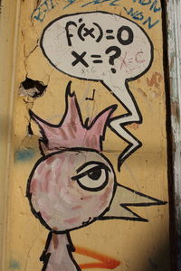 Close-up of graffiti on wall