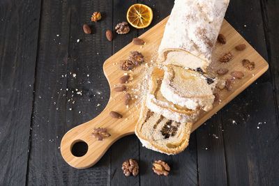 High angle view of bread on cutting board