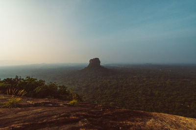 Scenic view of land against sky