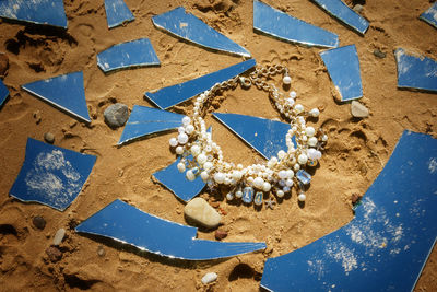 High angle view of star shapes on beach