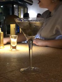 Wine glass on table in restaurant