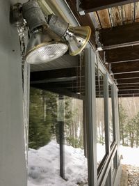 View of icicles hanging from window