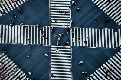 High angle view of people walking in city