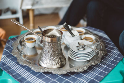 High angle view of tea served in tray on table