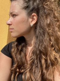 Portrait of young woman looking away