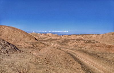 Scenic view of desert against sky