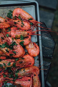 Spot prawns shrimp seafood in butter garlic parsley camping outdoors