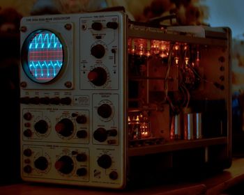 Low angle view of illuminated lighting equipment on table