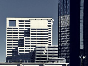 Low angle view of modern building against clear sky