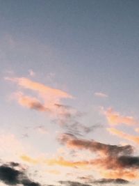 Low angle view of clouds in sky during sunset