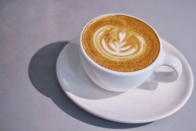 High angle view of cappuccino on table
