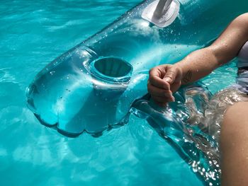 Woman swimming in pool