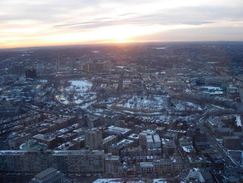 Aerial view of city at sunset